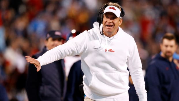 Nov 23, 2023; Starkville, Mississippi, USA; Mississippi Rebels head coach Lane Kiffin reacts during the second half against the Mississippi State Bulldogs at Davis Wade Stadium at Scott Field. Mandatory Credit: Petre Thomas-USA TODAY Sports